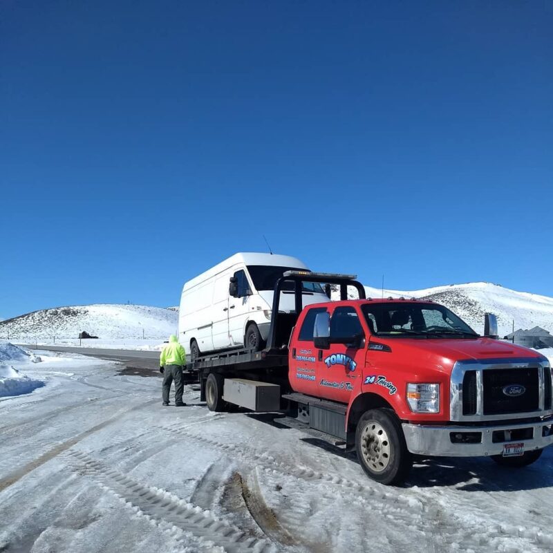 van broke down on mountain road, being towed away. Part of van life